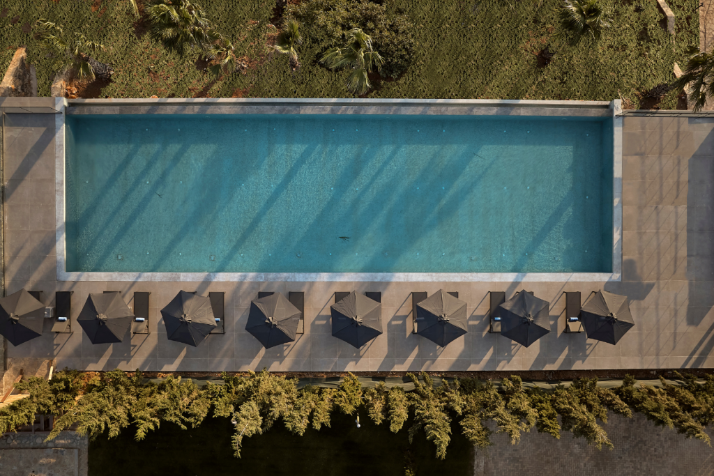 Pool of St. Nicolas bay hotel from above