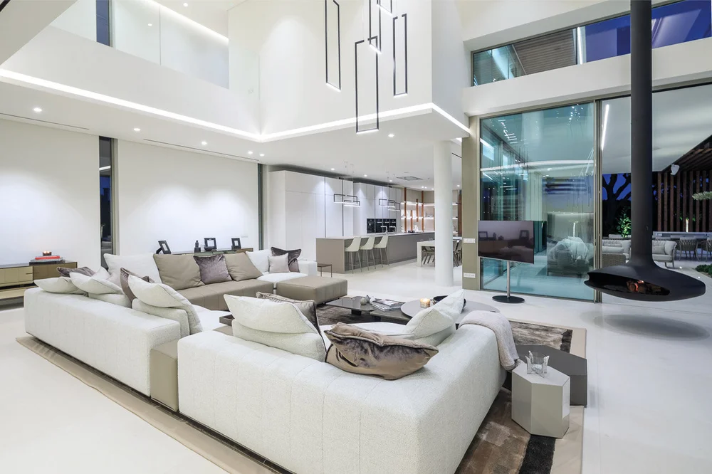 Contemporary house by Vasco Vieira featuring open spaces and natural light
