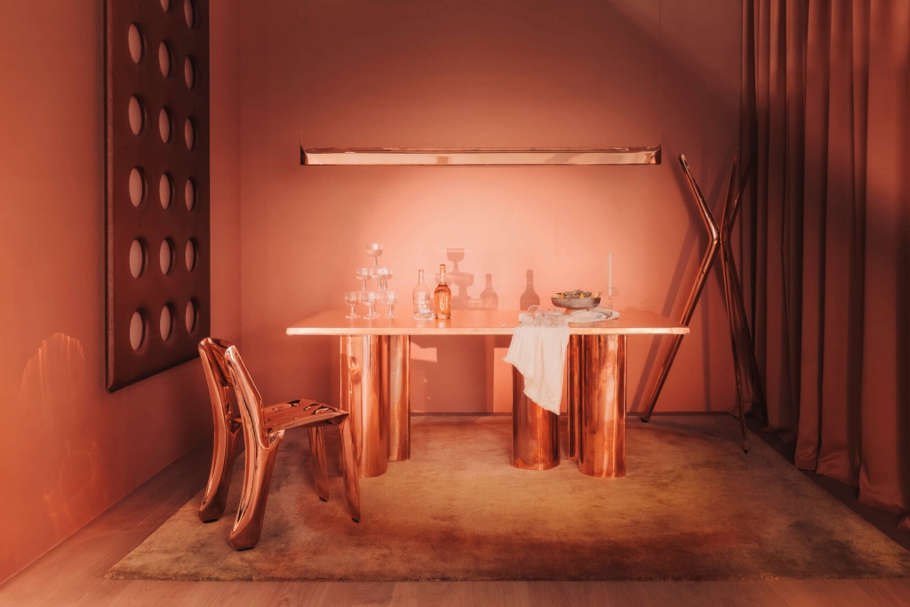 ICFF luxury room with salmon walls and rose gold furniture