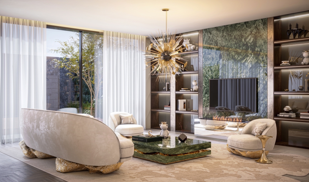 white walls, black bookcase, window, television, white sofa and armchairs, green and gold center table, gold suspension light, beige rug, lisbon design week