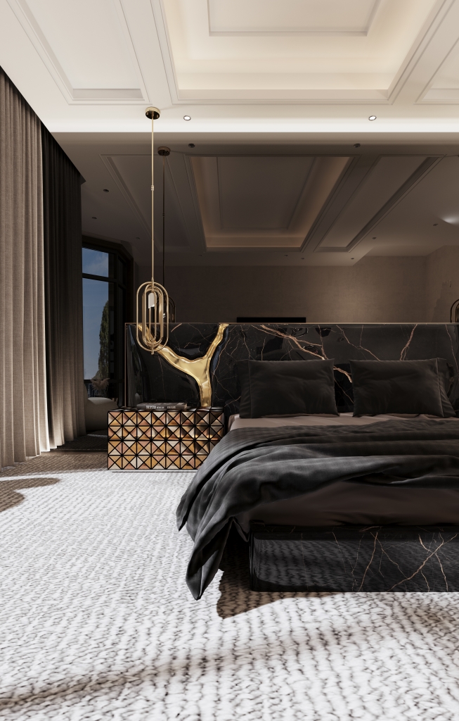 Moody and dramatic bedroom design featuring a dark bed with a stunning black marble headboard heavily veined with gold, which includes an organic gold metallic inlay. Next to the bed is a geometric nightstand composed of reflective triangular patterns in gold and dark tones, under a minimalist hanging gold pendant light. The bed faces a high-texture white carpet. luxury bedrooms