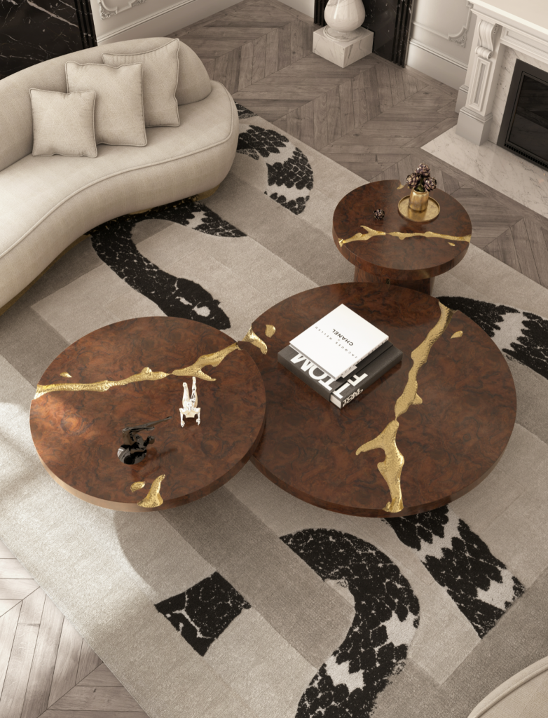 Luxury Wood Furniture, An overhead view of a set of three round wooden coffee tables with distinctive gold organic veins cutting through the surface.
