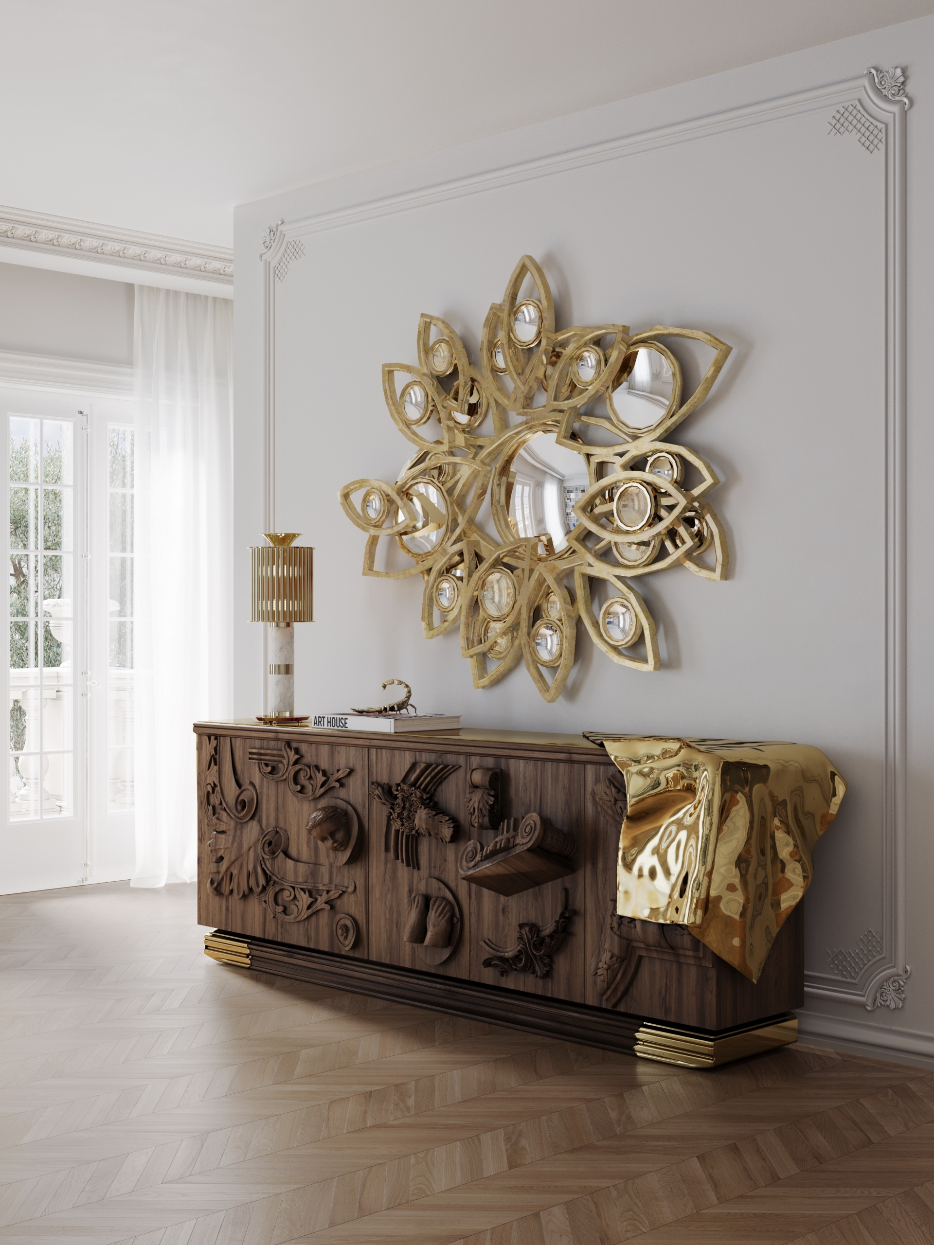 An elegant wooden credenza featuring intricate carvings and a draped gold accent, paired with a sunburst-style gold mirror. Luxury Wood Furniture