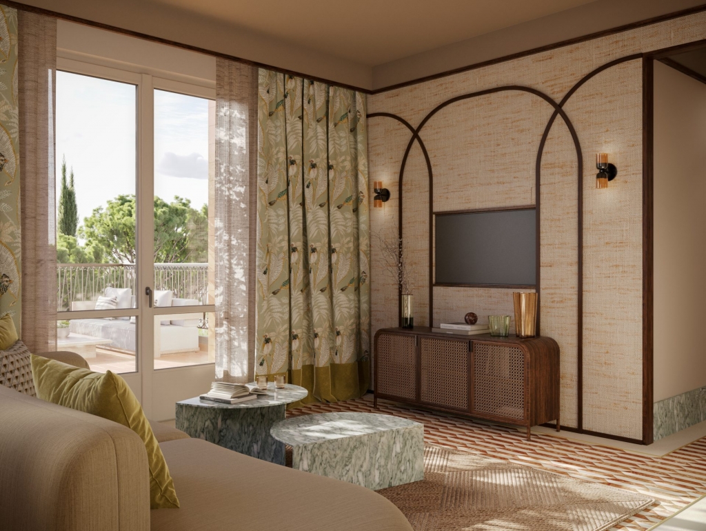 Mediterranean-style living room with arched wooden wall paneling, patterned bird-print curtains, green marble coffee tables, and a rattan TV console, opening to a terrace with cypress trees. interior designers