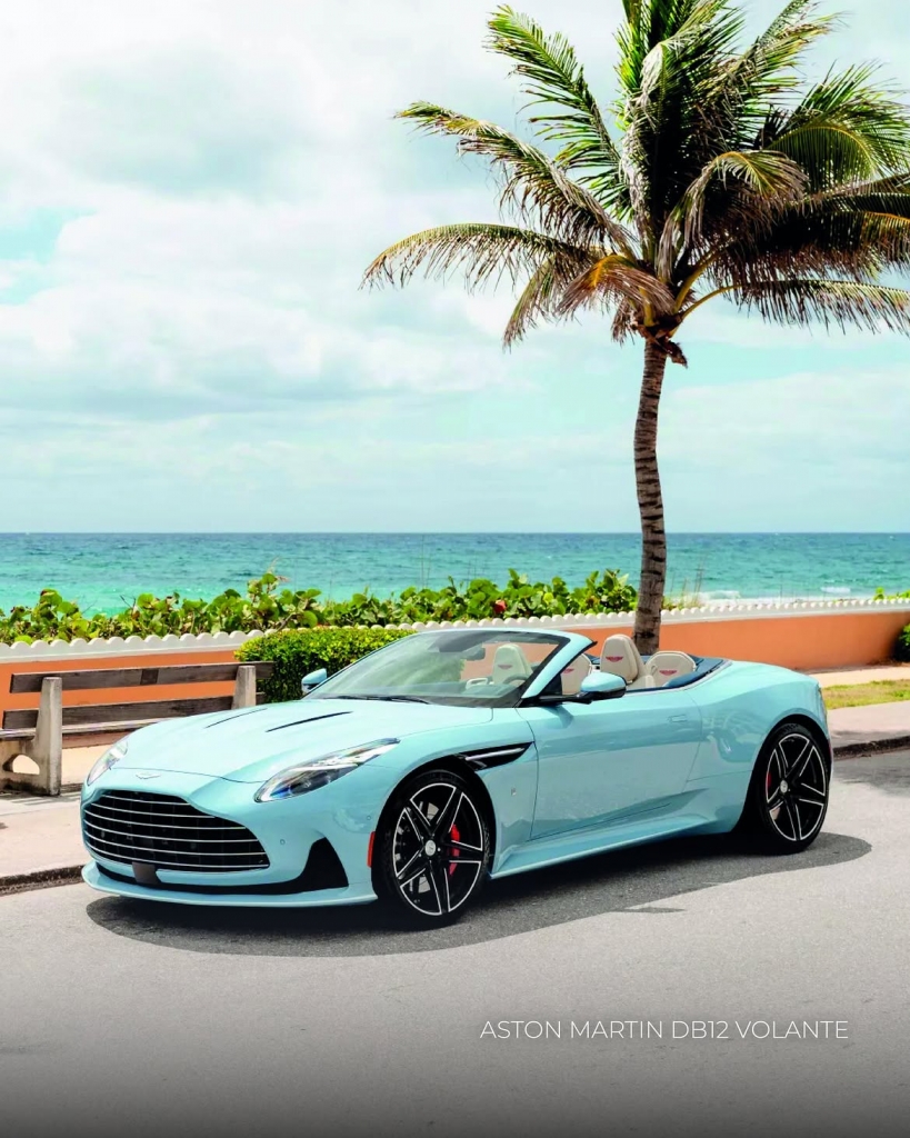 Aston Martin DB12 Volante on open road, refined British grand tourer