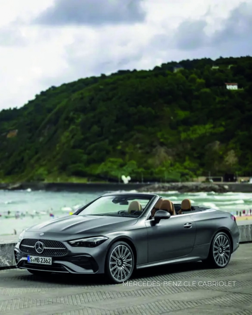 Mercedes CLE Cabriolet driving with soft top down, modern luxury design