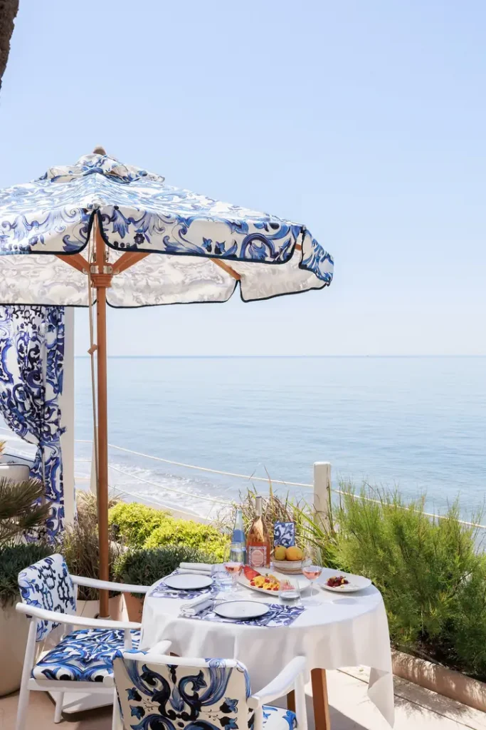 Relaxed luxury overlooking Marbella's golden beach with exclusive loungers, designer parasols, and uninterrupted Mediterranean Sea views at La Cabane.