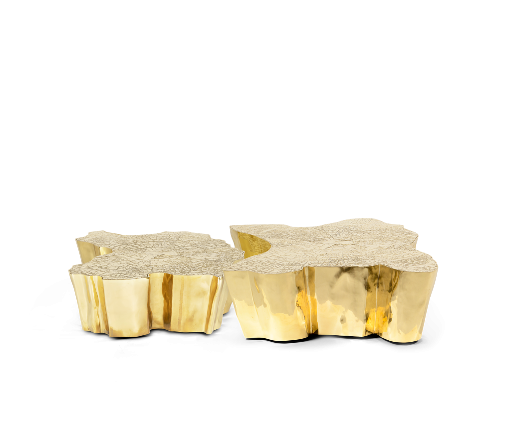 Two organic-shaped gold coffee tables with a textured tree-ring top and mirror-polished sides, luxury design.