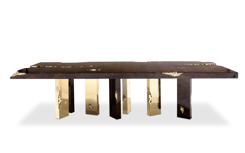 uxury furniture pieces - Empire dining table’s surface is made in mahogany, coated in a fine wood veneer, with high polished brass details to fill the cracks. Its legs, also made from mahogany are finished the same way, and with polished brass sheets.