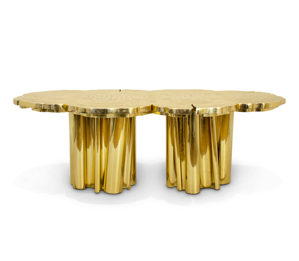 Gold dining table with a scalloped tree-ring top set on two fluted cylindrical pedestal bases, luxury design.