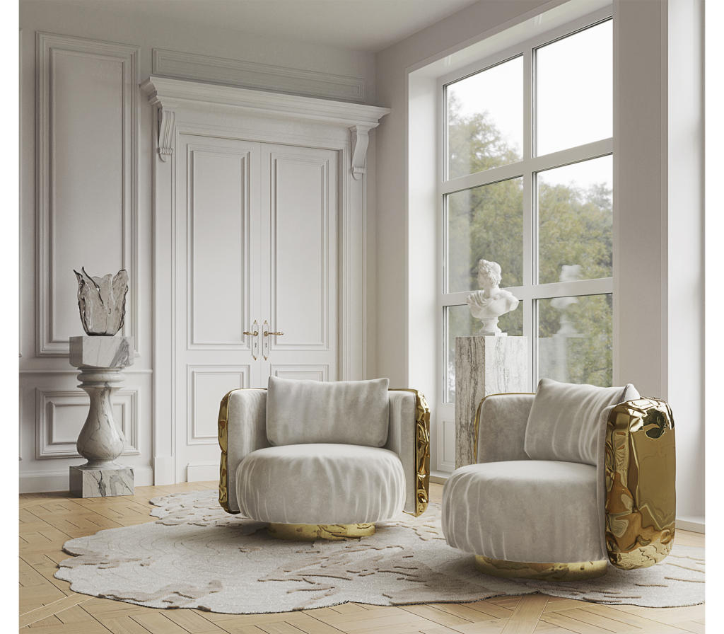 Luxury living room featuring two Imperfectio armchairs upholstered in soft beige fabric with sculptural polished brass sides, set against elegant wall paneling and large windows, luxury armchair.