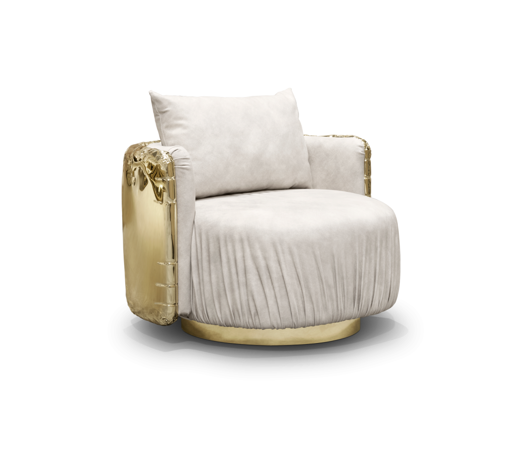 Cream velvet round armchair with ruched fabric detailing and a sculptural textured gold panel back, set on a polished gold circular base-luxury armchair