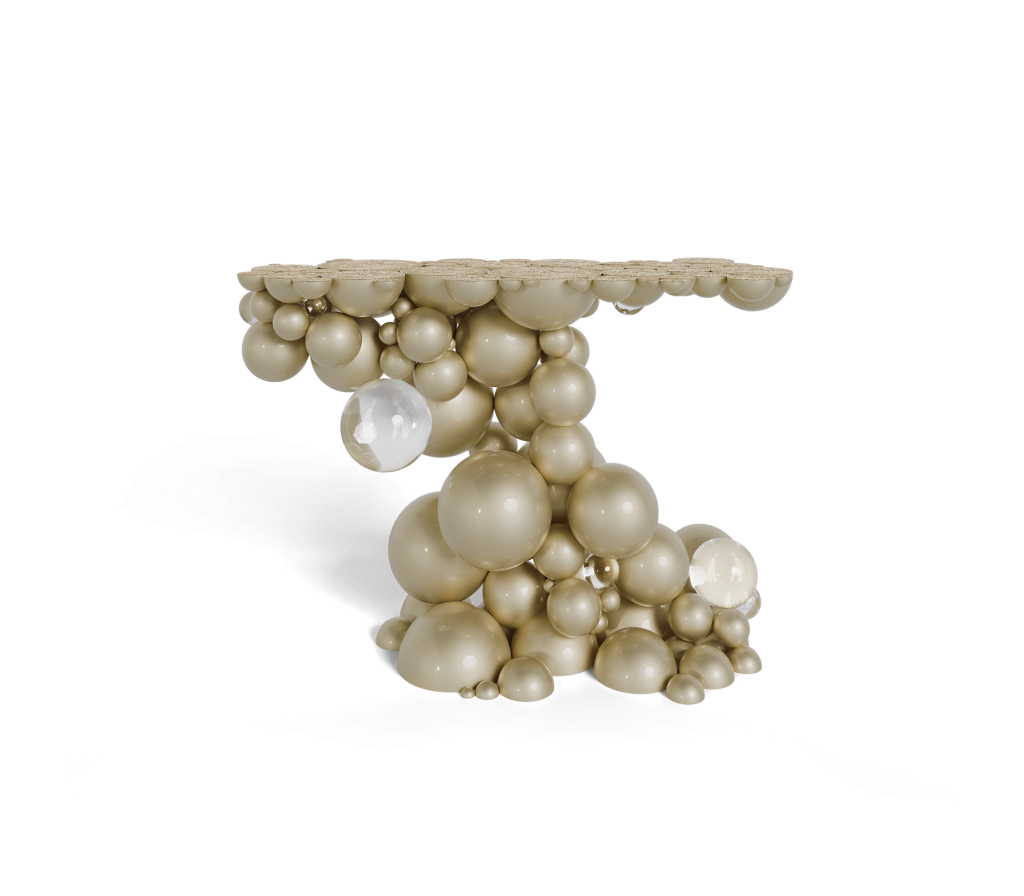 Gold console table composed of stacked spheres of varying sizes supporting a scalloped tabletop, luxury design.