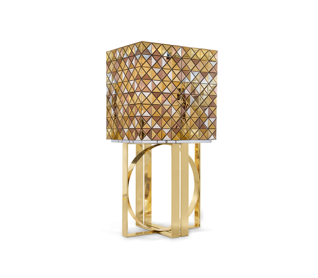 Gold and bronze pixelated cabinet resting on a geometric ring-and-bar metal base, luxury design.