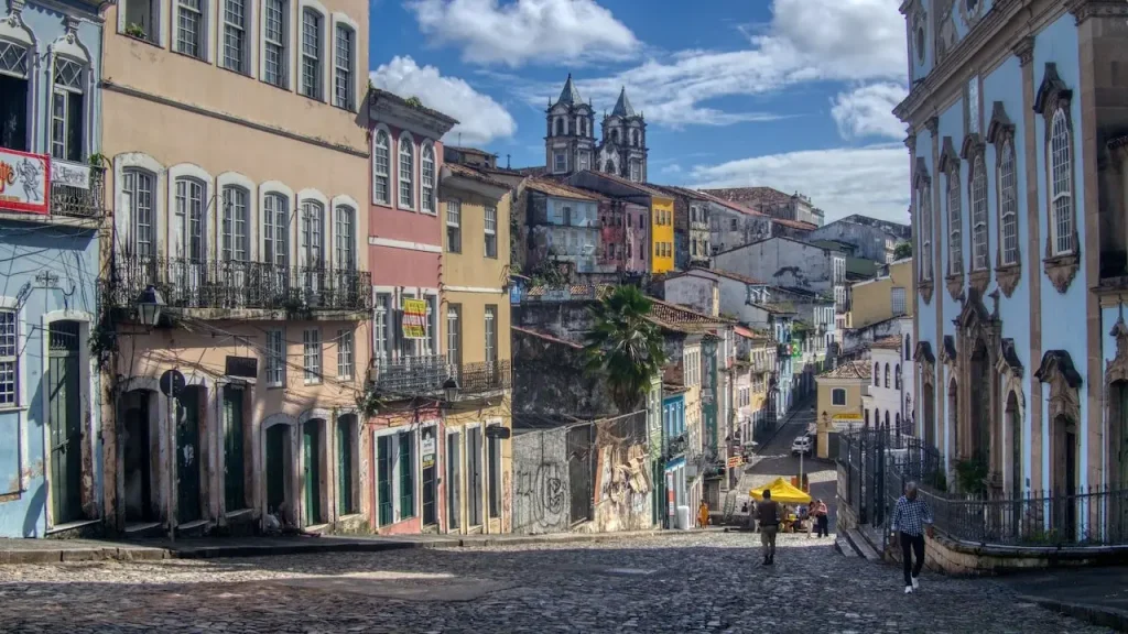 Historic cobblestone street with colorful colonial buildings in Pelourinho, Salvador -the best places to live in brazil