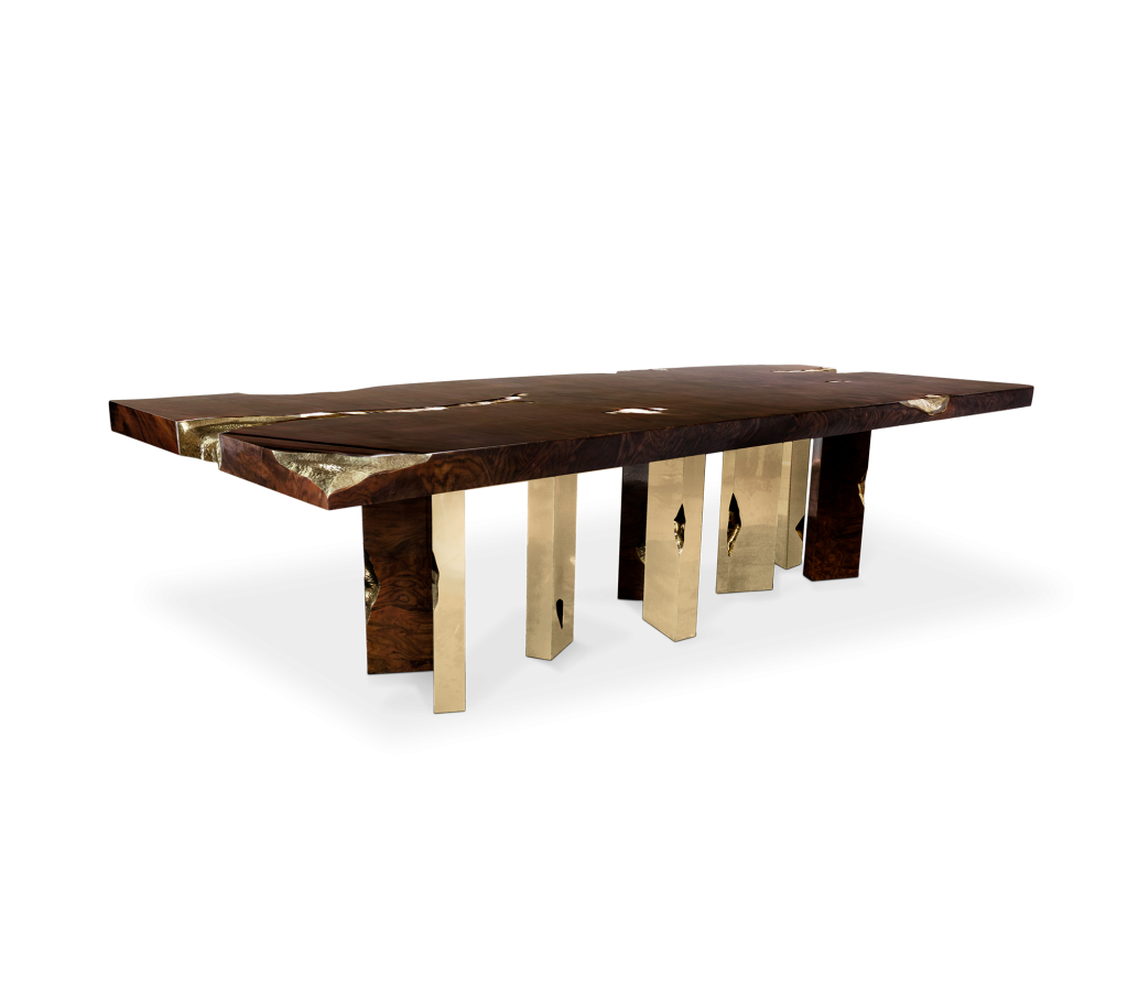 Rectangular dark wood table with sculpted gold and burl-wood faceted legs, studio shot -luxury dining table