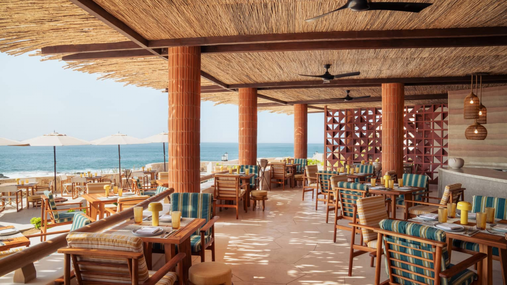 Open-air oceanfront dining terrace at Four Seasons Los Cabos