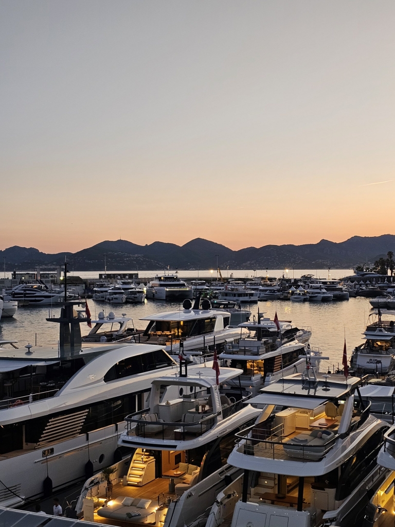 Yacht Destinations — luxury yacht in Cannes at sunset, surrounded by the golden Mediterranean light on the French Riviera