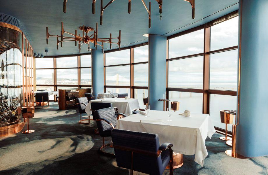 Michelin Experiences in Portugal – Fifty Seconds restaurant interior with panoramic views over the Tagus River and Lisbon skyline