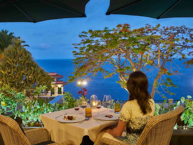Michelin Experiences in Portugal – Il Gallo d’Oro dining table with panoramic sea views in Madeira, showcasing refined Michelin-starred dining