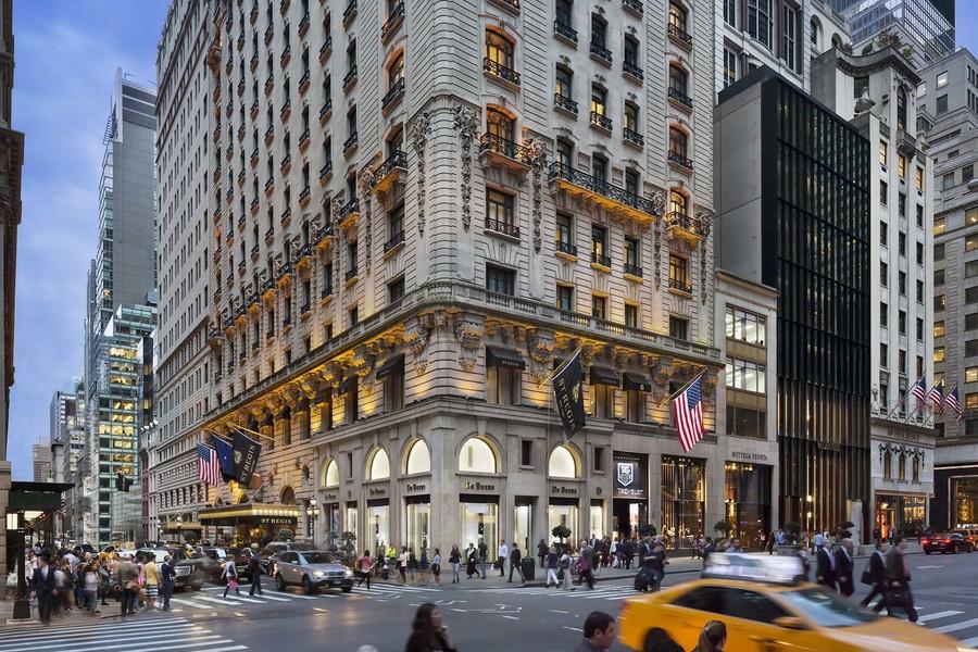 St. Regis hotel building and busy street corner in New York City -best places to live