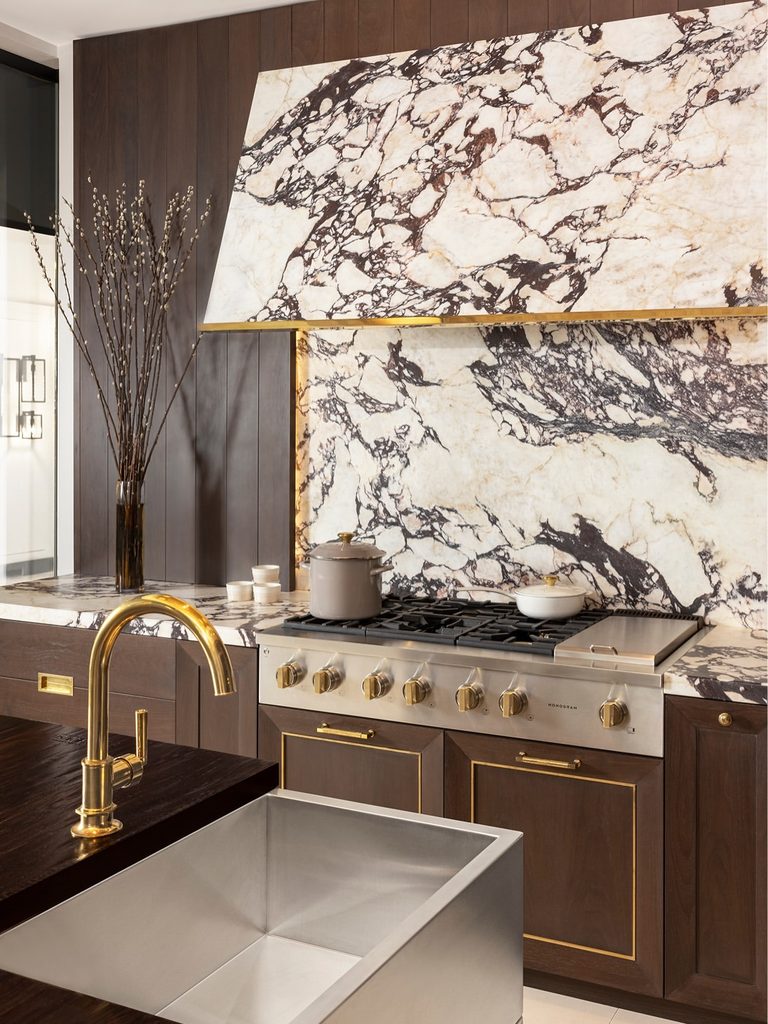 Artistic Tile natural stone installation highlighting the artistry of luxury interior design