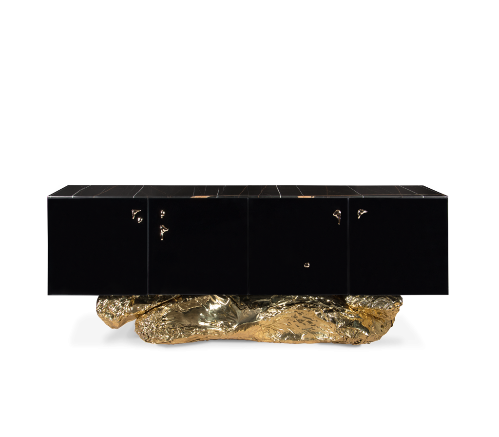 Black lacquered Angra sideboard with dripping gold hardware and a crumpled gold-leaf sculptural base, shot on white background – statement sideboard.