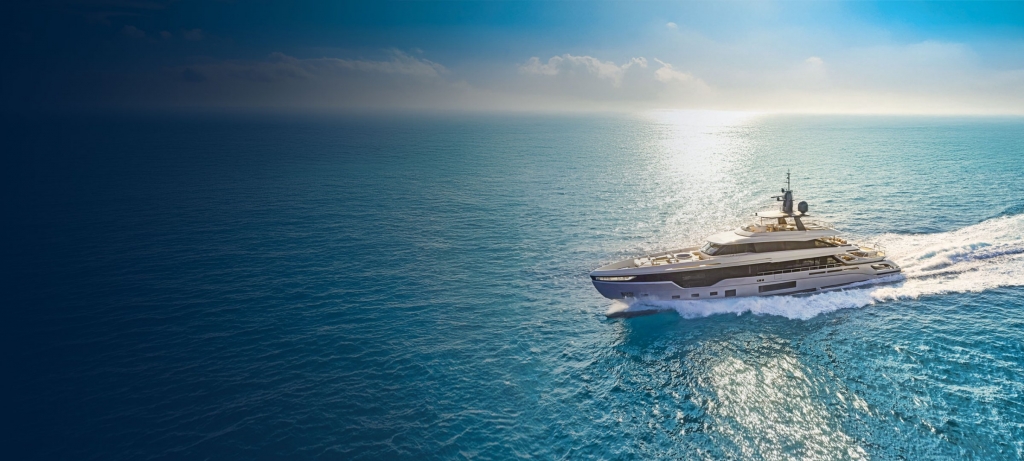 A sleek luxury motor yacht cruising across sparkling open sea under a bright sky during the Cannes Yachting Festival 2026.